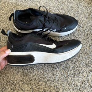 Black and white platform Nike shoes